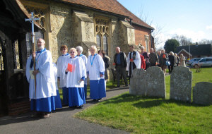 Procession reaches the church